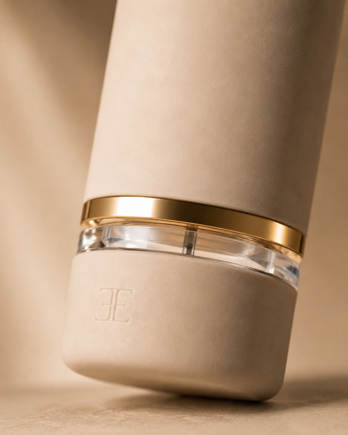 EMRI signature floating ring detail with the polished gold ring and lucite spacer reading as one continuous gesture
